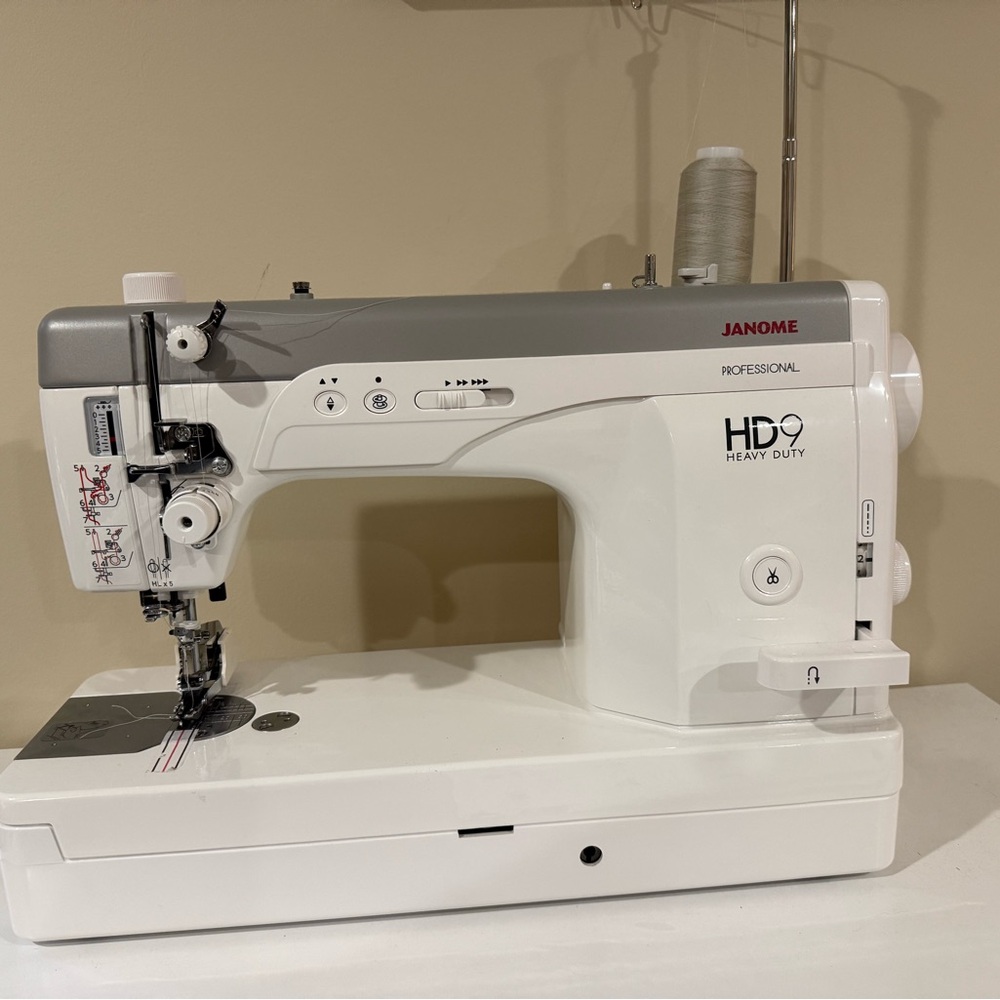 HD9 Professional Sewing Machine with free motion quilting kit and walking foot
